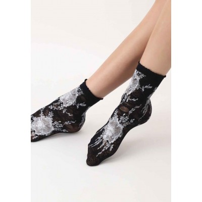 Chaussette fleurie blanc/noir marque Oroblu