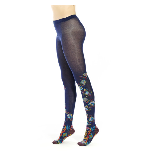 Collants bleu marine avec des motifs de fleurs grimpantes aux couleurs vives s’étendant jusqu’aux genoux.