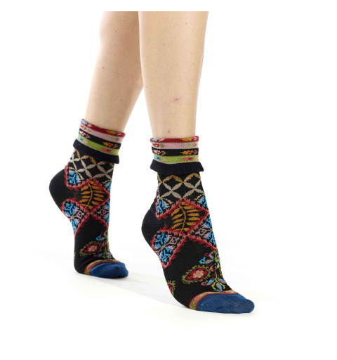 Chaussettes noires de la marque Dub & Drino avec motifs géométriques et floraux, bord-côte à revers.