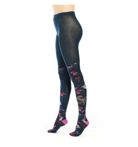Collants Pronus Serrulata, Fil de Jour. Bleus avec des fleurs roses et rouges en spirale, talons roses et pointes marrons.