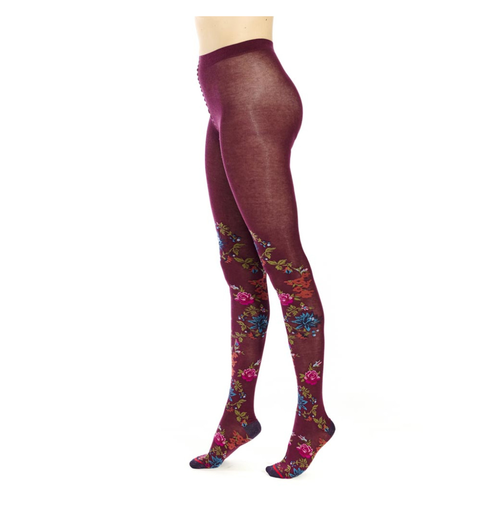 Collants Bloom, Fil de Jour. Rouges avec des fleurs bleues et roses remontant le long de la jambe, talons et pointes bordeaux.