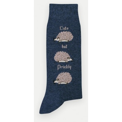 Chaussette motif "Cute But...